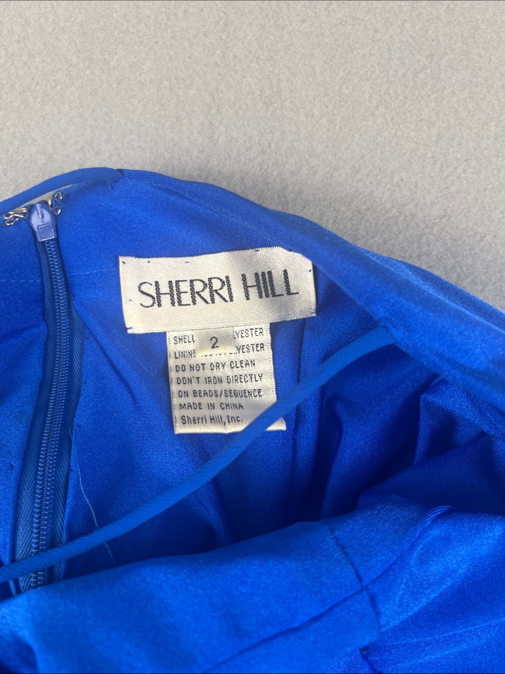 Sherri Hill Cobalt Blue One Shoulder party dress (Flawed)
Size: 2 - Picture 10 of 10